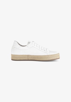 Low-top white leather sneaker with lace-up closure and thick woven beige platform sole, viewed from the outer side.