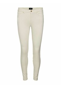 Úzké džíny ve světle krémové barvě, vyrobené z elastického denimu. Mezi vlastnosti patří pět kapes, přední knoflík a zipový příklop. Hladká textura.