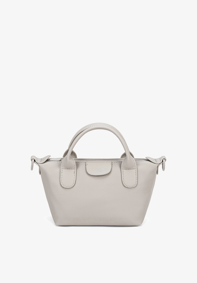 Petit sac à main en cuir beige avec doubles poignées, fermeture éclair sur le dessus et détails de couture minimalistes, présenté sur fond blanc.