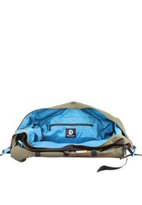 Olive green duffel bag with a bright blue patterned interior. Features an exterior pocket and zip closure. Durable fabric and adjustable strap.
