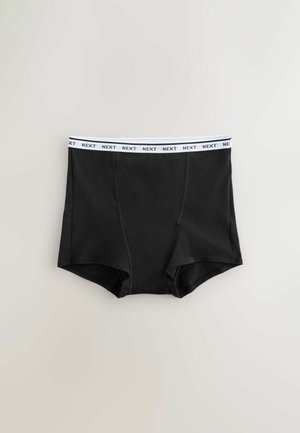 Culottes hipster en coton noir avec une ceinture élastique blanche arborant la marque « NEXT » répétée. Texture lisse et design classique.