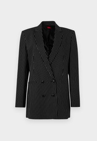 Black double-breasted blazer with white pinstripes, sharp lapels, long sleeves, textured fabric, and front pockets.
