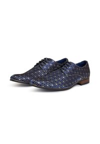 Navy blue dress shoes with a geometric silver pattern, pointed toe, and black laces; features a wooden heel. Smooth texture throughout.