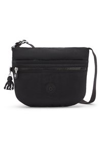 Schwarze Stoff-Crossbody-Tasche mit einem Reißverschluss-Fronttasche und verstellbarem Tragegurt. Mit rundem Logo und einem Charm, der am Reißverschluss befestigt ist.