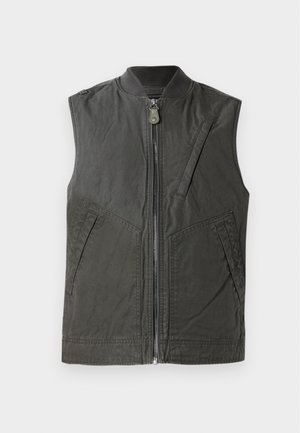 Sleeveless vest in dark olive green fabric, featuring a front zipper, ribbed collar, and two side pockets with angled seams.