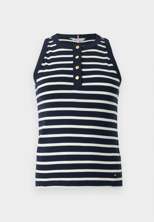 Marineblå og hvit, horisontalt stripet, ermeløs topp med rund hals og fire gullknapper nedover fronten.