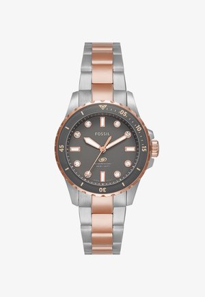 Fossil watch with a gray dial, rose gold accents, and crystal markers. Metal bracelet features silver and rose gold links. Water-resistant to 100m.