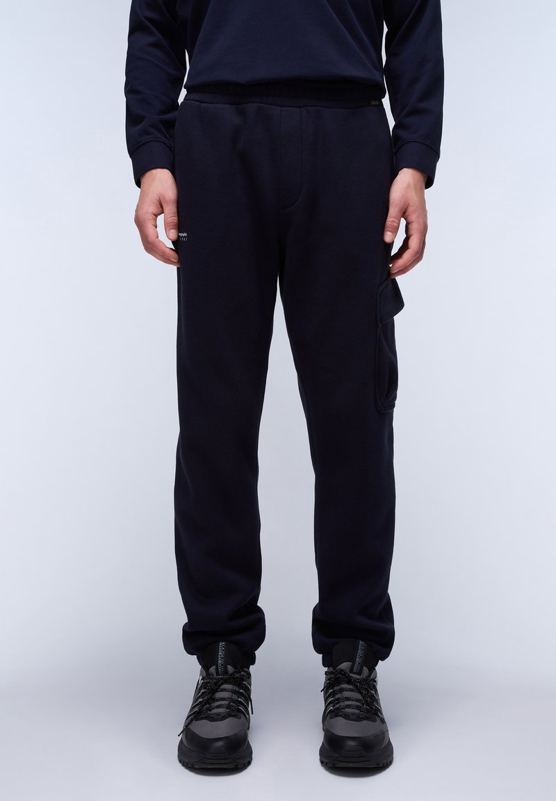 Navy sweatpants made of cotton blend, featuring an elastic waistband, side pockets, and a cargo pocket on the left leg. Text logo on front.