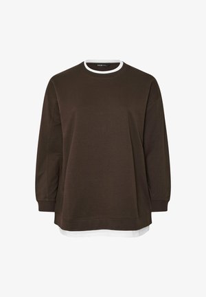 Brązowy długi rękaw sweatshirt z białym wykończeniem przy okrągłym dekolcie. Charakteryzuje się luźnym krojem oraz warstwowym białym wykończeniem, które wychodzi poniżej brązowego materiału.