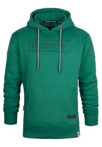 Grüne Kapuzenjacke mit Kängurutasche, Zugverschluss-Kapuze und gerippten Bündchen. Überdrucktes Logo auf der Vorderseite und strukturiertes Material.