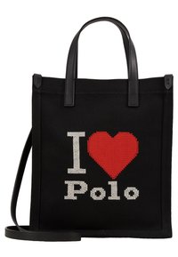 Černá plátěná taška s černými koženými uchy, s červeným srdcem a bílým textem "Miluji Polo."
