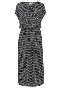 Vestido maxi en negro con un patrón geométrico blanco, con mangas cortas, cintura ajustable con cordón y aberturas laterales.