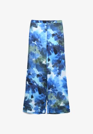 Lightweight, flowy pant with a blue and green floral pattern. Features a wide-leg design, elastic waistband, and side slits for movement.
