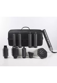 Frisur-Werkzeugset mit einem schwarzen Koffer, mehreren Bürstenaufsätzen und einem Haartrockner mit strukturiertem Griff und Steuerknöpfen.