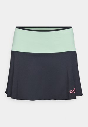 Fekete sport szoknya világoszöld széles derékpánttal és kis rózsaszín végtelen jel logóval az elején.