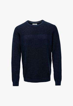 Suéter de punto azul marino hecho de una tela suave, con un cuerpo texturizado y un panel de pecho liso en contraste, con un cuello redondo.