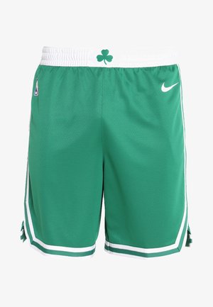 Groene basketbalschoenen van ademend meshmateriaal. Voorzien van een witte elastische tailleband, het Celtic klaverlogo en witte zijkanten.