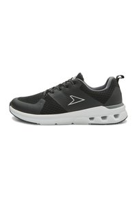 Black athletic shoes with mesh detailing, a sleek design, white sole, and reflective accents. Features a padded collar and flat laces.