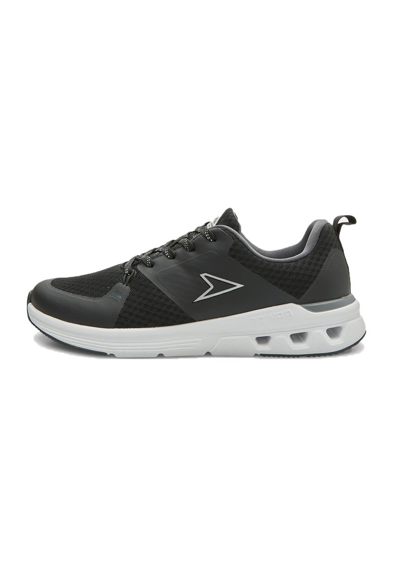 Black athletic shoes with mesh detailing, a sleek design, white sole, and reflective accents. Features a padded collar and flat laces.
