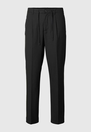 Pantalones negros de corte ajustado con cinturilla elástica y cordón, con pliegues en la parte delantera y un diseño de pierna recta y elegante. Textura suave.