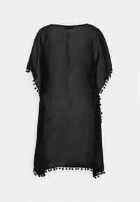 Black sheer kaftan with wide sleeves, featuring a scalloped hem adorned with small black pom-poms. Lightweight and flowy design.