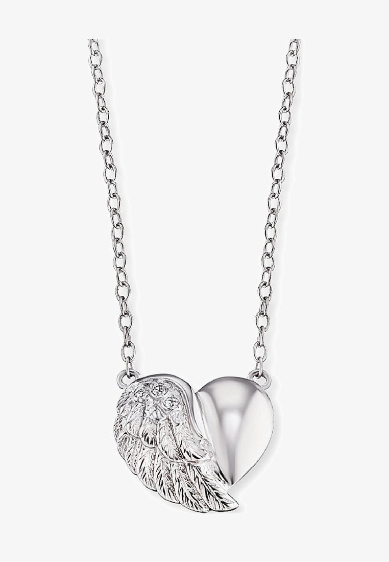 Silver hjärtanvända med en sida som har rikt utsmyckade vingar, som framhäver strukturerade detaljer och en polerad yta.