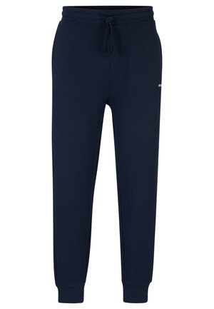 Navy blue sweatpants with an elastic waistband, drawstring closure, and ribbed cuffs. Features a small white logo on the front.