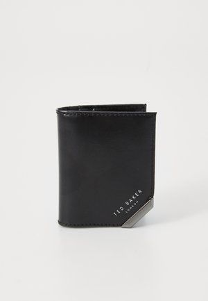 Black leather wallet with a smooth texture, featuring a silver accent and embossed "Ted Baker London" logo on the front.