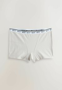 Boxer gris clair avec ceinture élastique blanche, marqué "NEXT" en noir, présenté à plat sur un fond neutre.