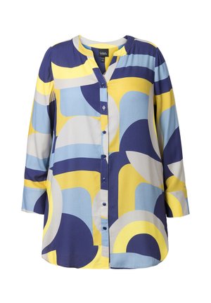 Lange mouwen blouse met abstracte geometrische patronen in geel, marineblauw, lichtblauw en grijs op een losse pasvorm.