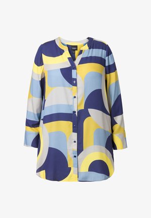 Langærmet skjorte med knapper og abstrakte geometriske mønstre i gul, marineblå, lyseblå og grå i en løs pasform.