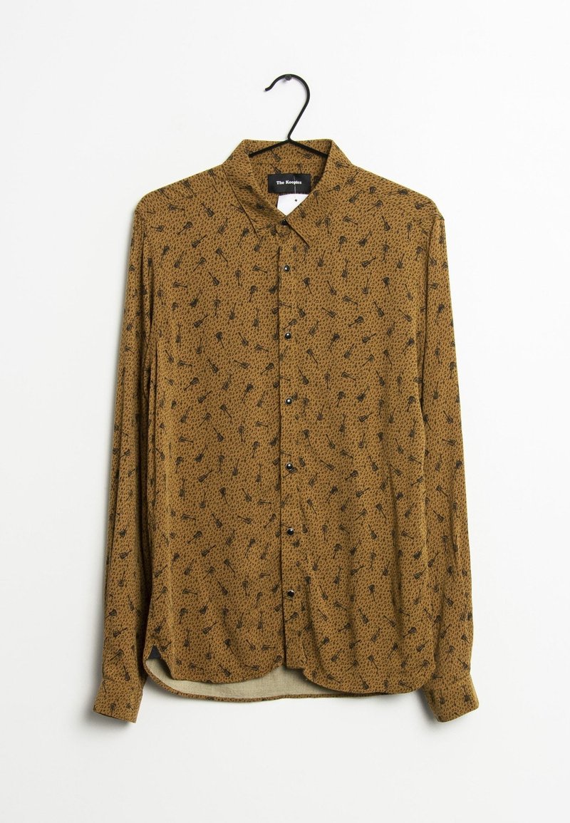 Chemise à manches longues, marron avec motif noir, fabriquée en tissu léger, avec un col et des fentes latérales en bas.