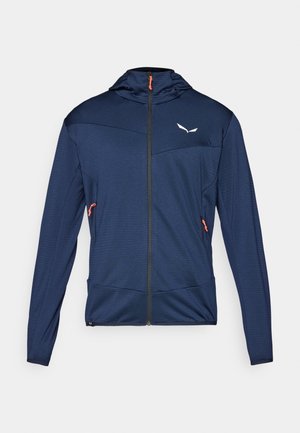 Marineblaues Zip-Jackett mit Kapuze, ausgestattet mit strukturiertem Stoff, orangefarbenen Reißverschluss-Highlights und einem weißen Logo auf der Brust.