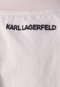 KARL LAGERFELD OVERSIZED SIGNATURE HEM - Pamata T-krekls - rose smoke
