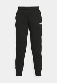 Pantalones de chándal negros hechos de material suave, con un ajuste ceñido, cinturilla elástica y el logo blanco de Puma en el muslo izquierdo.