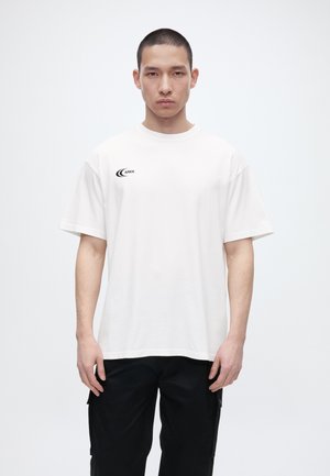 ARKK Copenhagen LIQUID BOXY TEE - Tričko s potlačou - off white