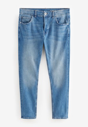 Skinny fit jeans in lichtblauwe denim. Heeft vijf zakken, riemlussen en een gladde textuur met subtiele vervaging en wassingdetails.