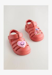 Valgt, red character