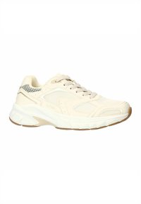 Chaussure de sport beige avec une tige en maille et en synthétique, bout rond, languette rembourrée et semelle amortissante ; présente un accent texturé près du talon.