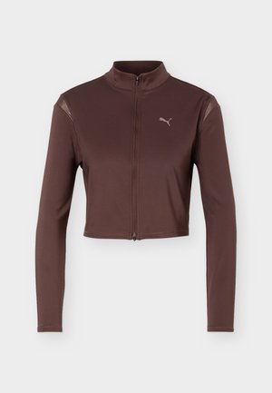 Veste courte marron à manches longues avec fermeture éclair frontale et col montant, ornée d'un petit logo Puma sur le côté gauche de la poitrine.