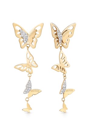 Boucles d'oreilles pendantes en forme de papillon doré avec des accents en cristal et "GUESS" gravé sur une aile de chaque papillon.