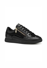 Baskets noires en cuir et textile, avec une fermeture éclair sur le côté, des lacets, et un design épuré avec une finition lisse et des accents texturés.