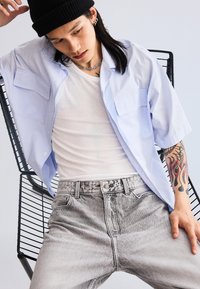 Bershka Tapered Fit - Jeans Relaxed Fit - grey