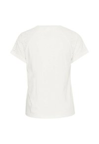 T-shirt bianco con maniche corte e dettagli in occhio di pernice sulle spalle, retro semplice e vestibilità rilassata. Materiale in morbido cotone.