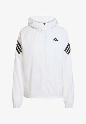 Biela zipová bunda s kapucňou, s čiernymi trojpruhovými akcentmi na rukávoch a malým čiernym logom na ľavej hrudi. Vyrobená z ľahkého materiálu.