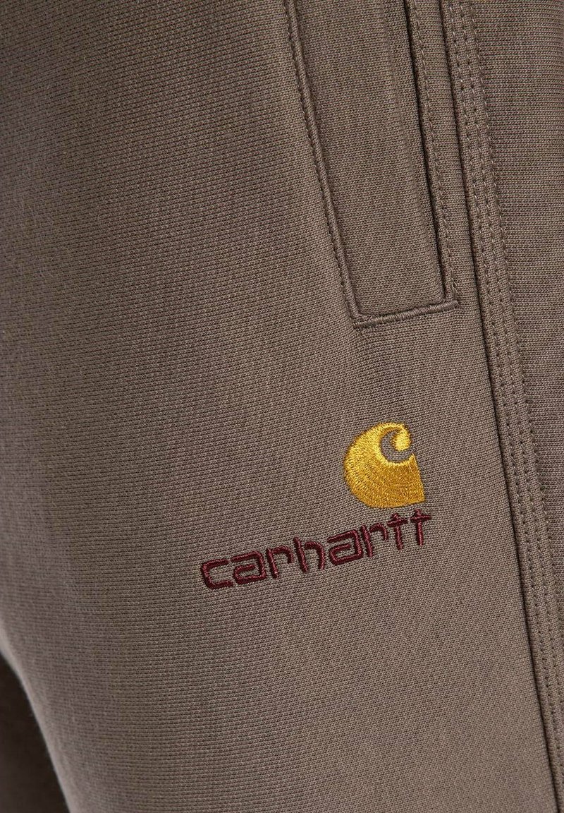 Carhartt WIP AMERICAN SCRIPT JOGGING - Pantalon de survêtement - brąz