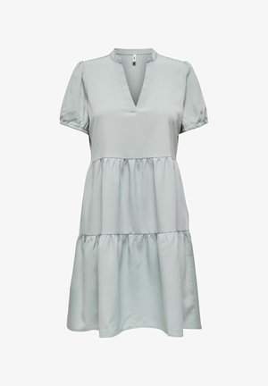 Light green tiered dress with short puff sleeves, V-neckline, made of smooth fabric, featuring a gathered waist and a flowing skirt.