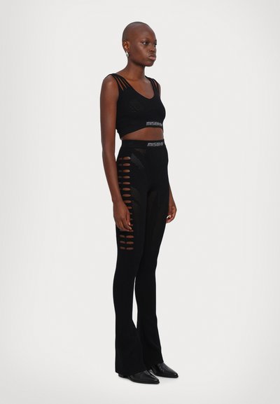 MISBHV BIANCA SEAMLESS TROUSERS - Hlače - black