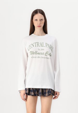 Oversized Long-Sleeve Self Care Social Club Graphic Tee - Long sleeved top - white