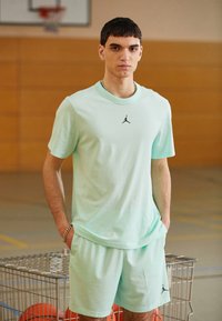 Jordan TOP - Sports T-shirts - mint foam/black